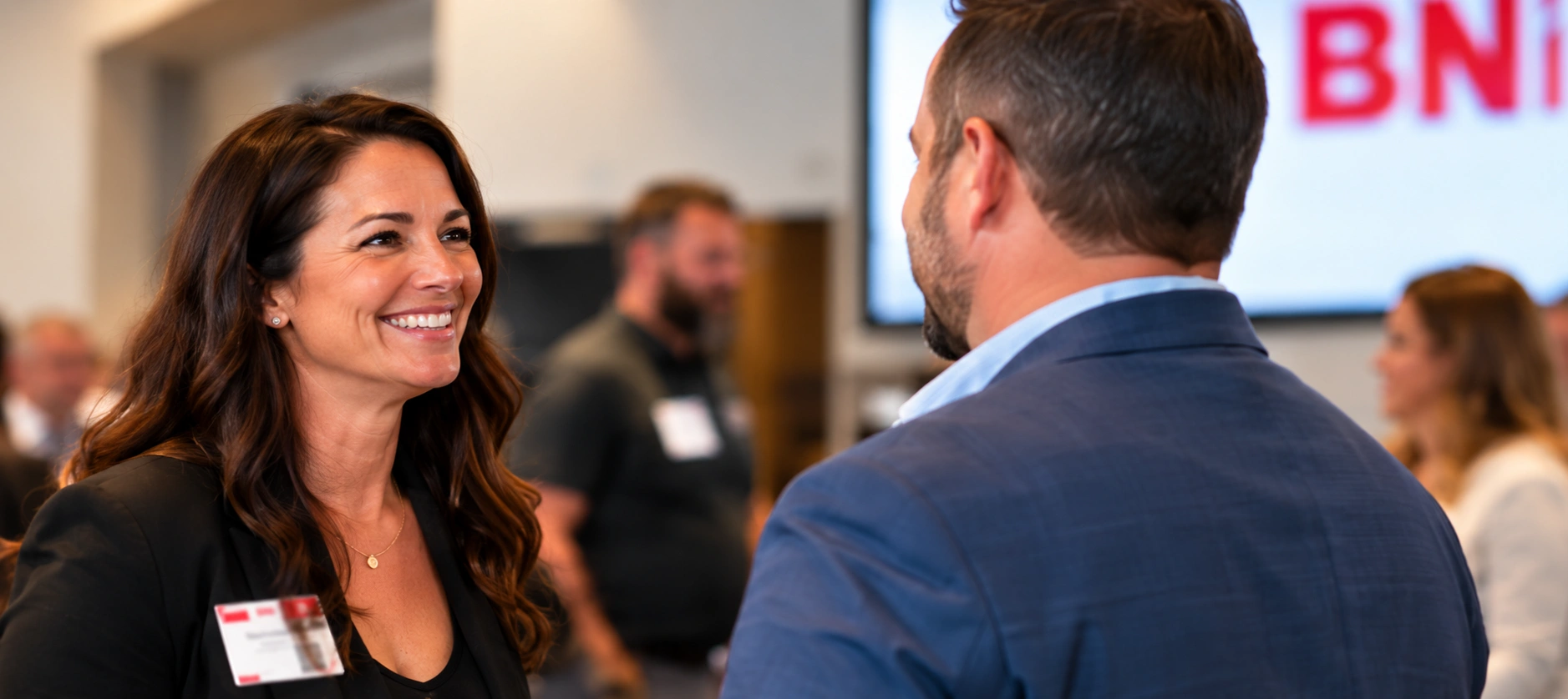 Two professionals getting to know each other at a networking event