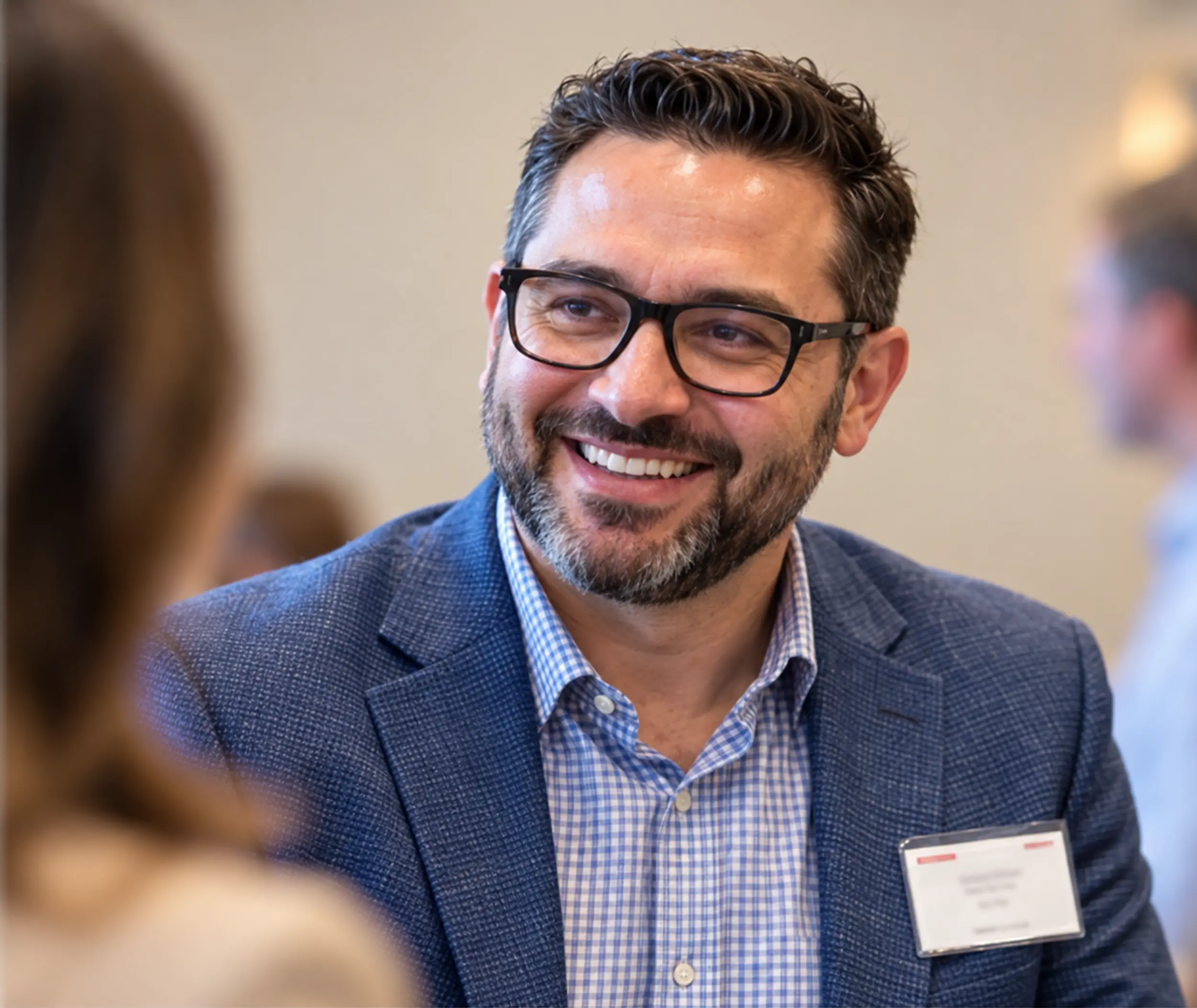 Meeting participant wearing a name badge